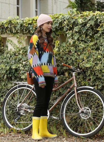 Colourful sweater and yellow boots